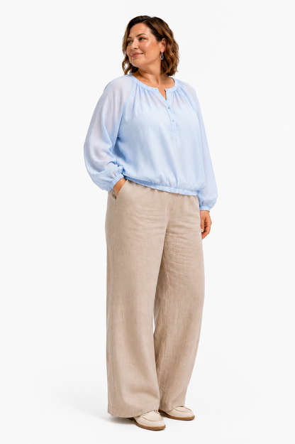 Women's loose raglan blouse B115 — lifestyle preview
